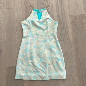 Lilly Pulitzer cocktail dress. Size 8, turquoise and gold overlay flower pattern